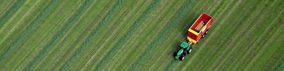 Tractor cutting grass