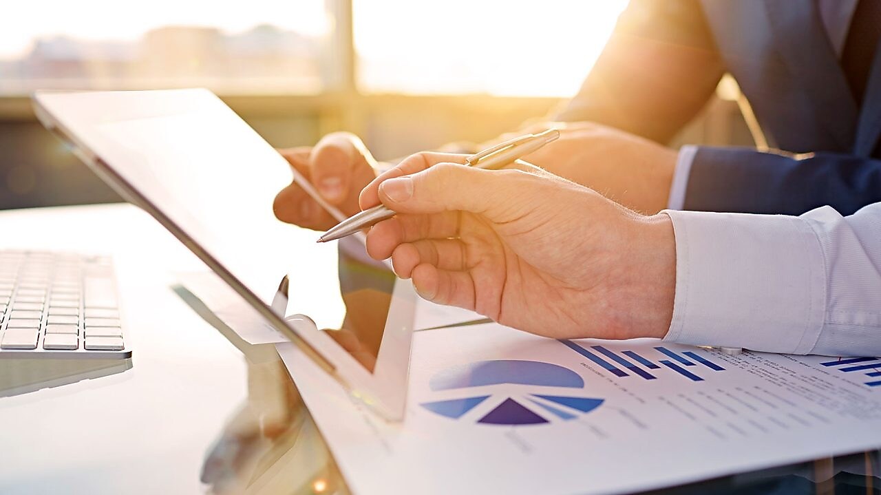 office worker reviewing on tablet