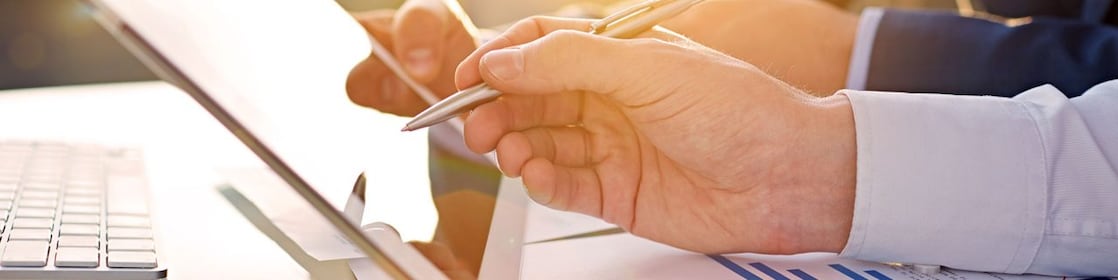 office worker reviewing on tablet