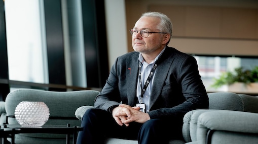Picture of Axel Plener sitting in a chair where he is working at the moment, Northern Lights in Stavanger. Picture is used on Shell.no website.