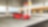 Rød Ferrari på Shell-stasjon med mann ved bensinpumpe