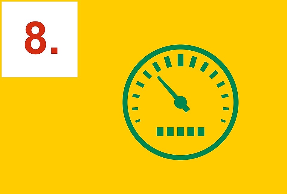 Grønt speedometer på gul bakgrunn