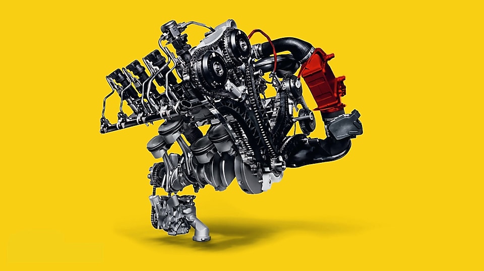 Luftkompressor i turboladingsmaskineri med gul bakgrunn
